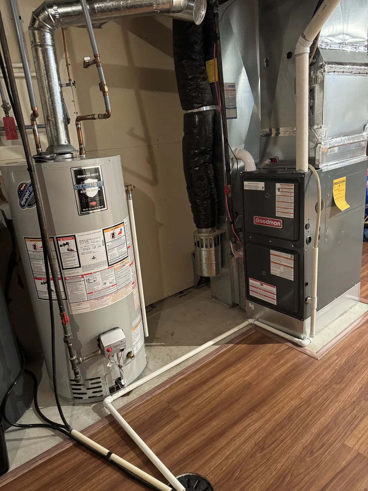 Hot water heater and furnace equipment in a residential service area